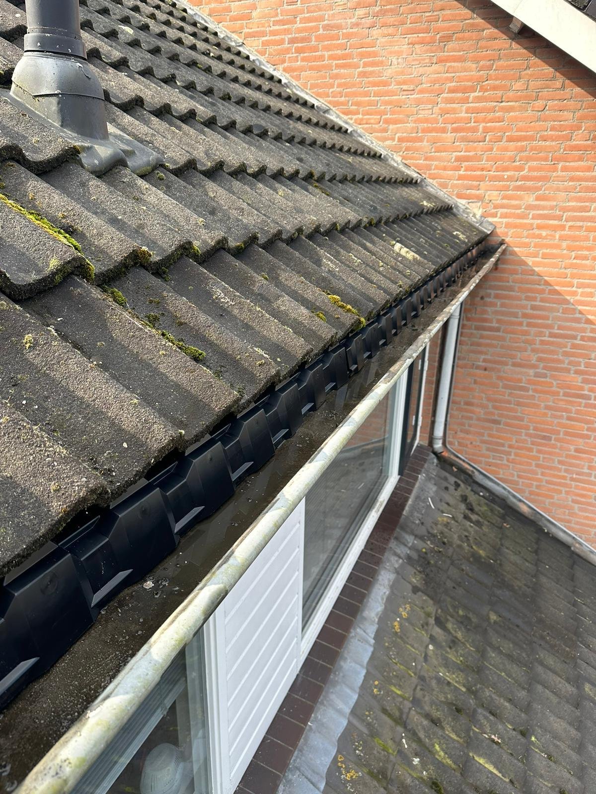 Dakonderhoud op woning